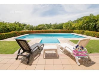 Covered outdoor living space with BBQ and dining at Royal Decameron Costa Blanca Panama