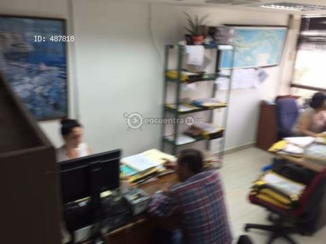 Reception or waiting area in Torre BAC office with city views and bay beyond