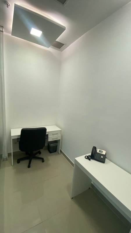 Modern executive workspace with glass door and ergonomic chairs in Punta Pacifica