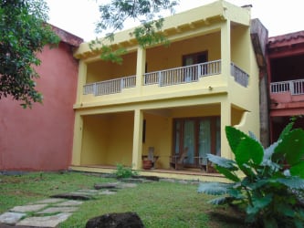 Beachfront ocean view during sunset with waves and sandy shore by Pedasí Los Santos Panama