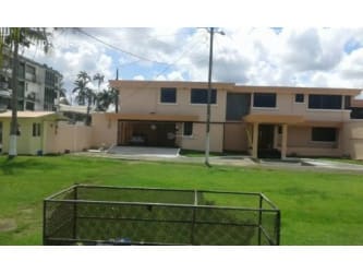 Spacious green yard with pool and colonial two-story home in Colón Panama for sale