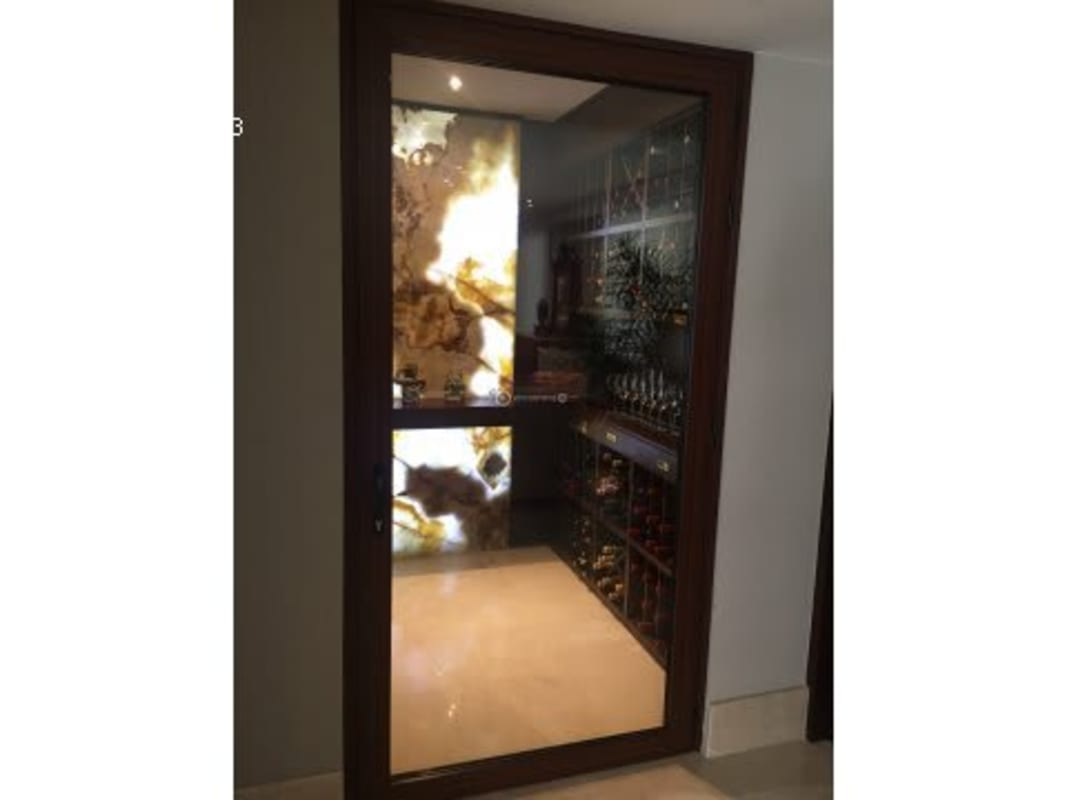 Resort-style pool with waterfall, jacuzzi, lush gardens luxury estate Altos del Golf Panama