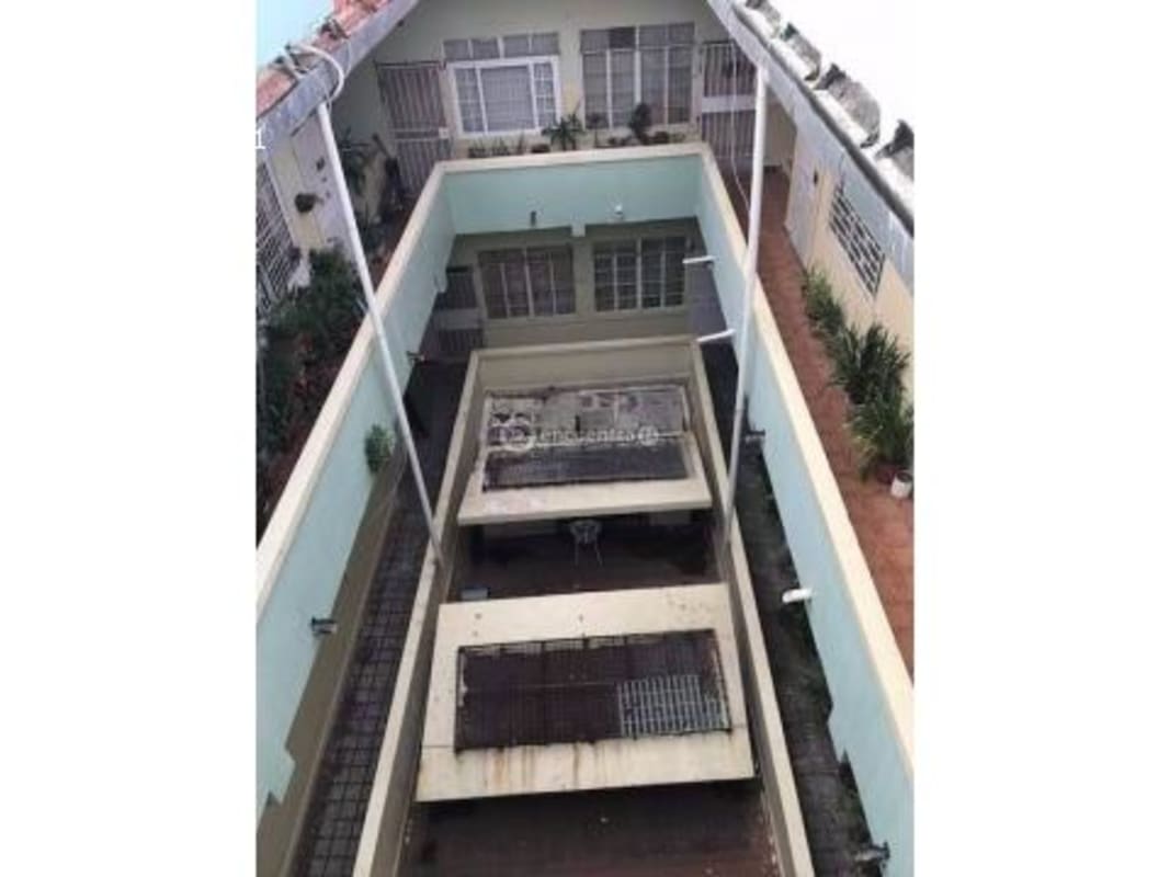 Multi-story balconies overlooking internal colonial courtyard Casco Viejo property